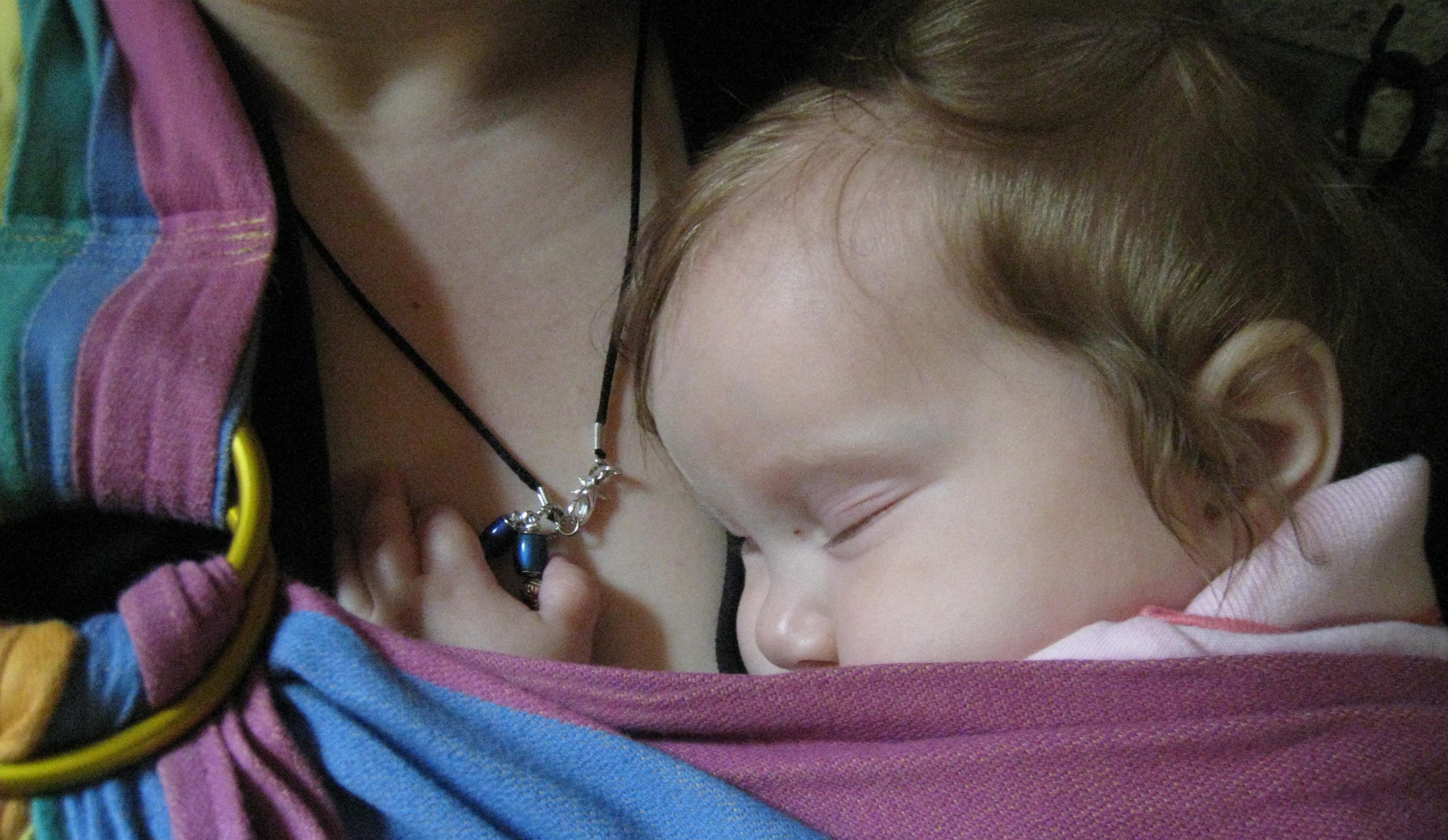 The third 'sleeping baby' in a long-discontinued, but still very loved, rainbow sling, 14 years ago