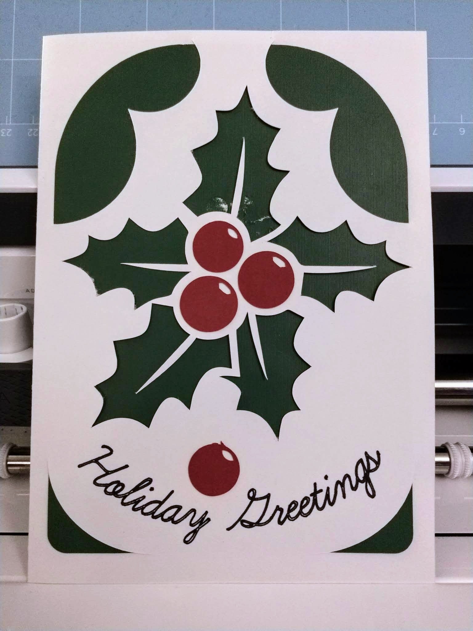 Stylized image of holly with red berries